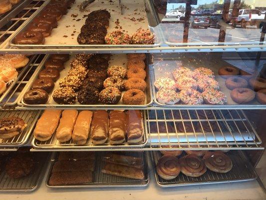 1st shelves are "regular" donuts, last shelves are "fancy"