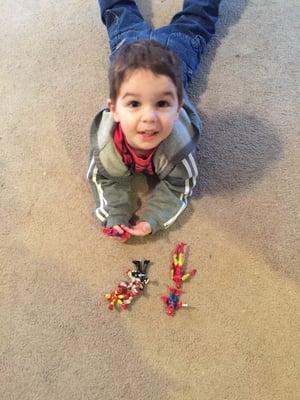 The toys he was allowed to take home. He's a happy boy!