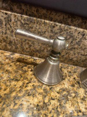 Uncleaned faucet handle