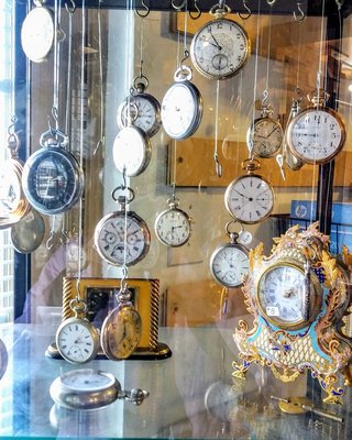 Beautiful display of suspended pocket watches at Stephens & Stephens Clocks!