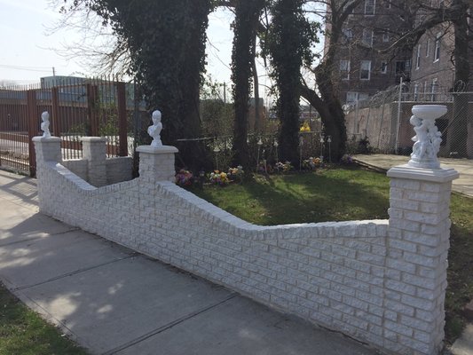 White brick fence.