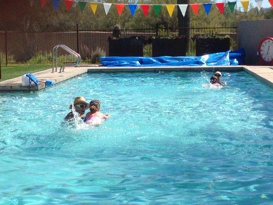 Miss Kim in the water, teaching the kids how to swim and be safe around water!