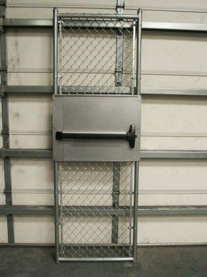 Custom chain link gate with panic bar.