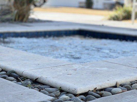 Custom Bullnose Edge on Travertine Spa Coping