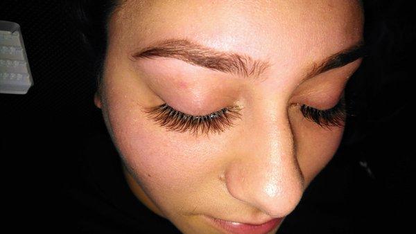 Classic lash with eyebrow threading to sculpt form