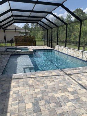 Pool with spa, raised beam and two waterfalls