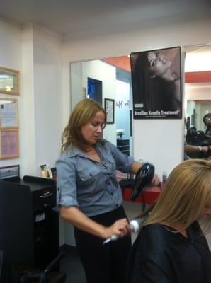 Danay working hard on her blowdry