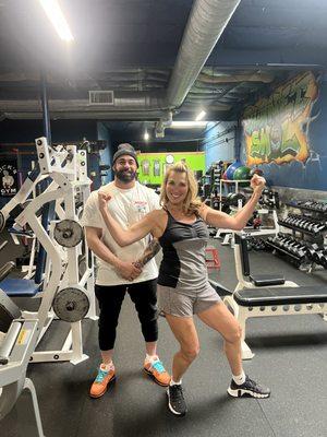 Client Juliette Goodrich and me flexing after she killed her workout