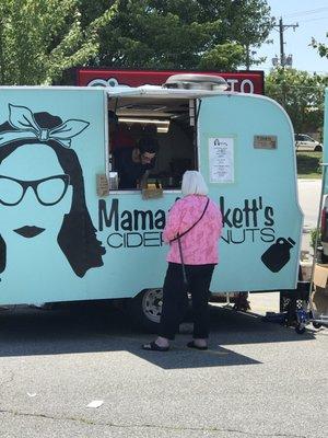 Little trailer, hot fresh donuts.