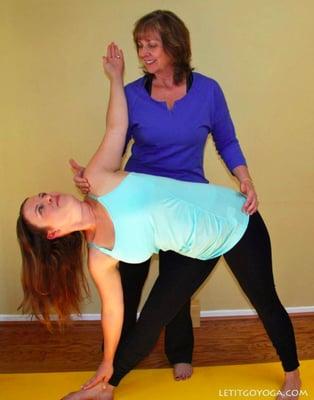 Let It Go Yoga owner, Sue Anne Parsons, teaching Triangle Pose