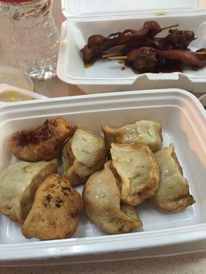 Fried pork dumplings and chicken on a stick.