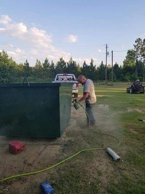 Dumpster repair and painting