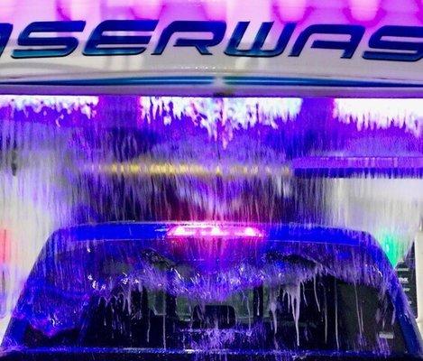 Car wash is applying wax and it comes out in a beautiful waterfall.