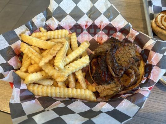 Brisket samich with 'seasoned' fries.  (They weren't seasoned.)