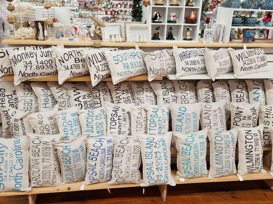 Latitude and longitude lumbar pillows.  We make in house and can customize to what you want. Make great personal gifts!