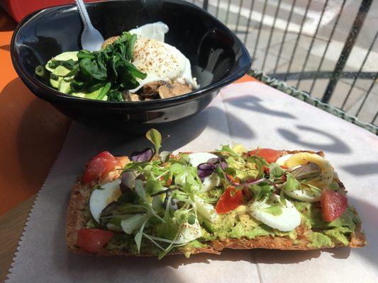 Smashed Avocado toast with hard boiled eggs and a Breakfast Bowl of hummus, poached eggs, avocado, mushrooms.