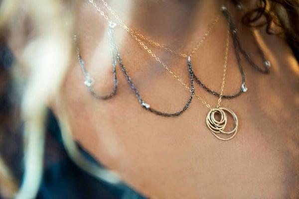 The Delicate Web layered with the Mini Sunset Necklace