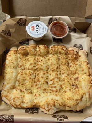 Free cheesy bread for birthday! Came with ranch and marinara sauce.