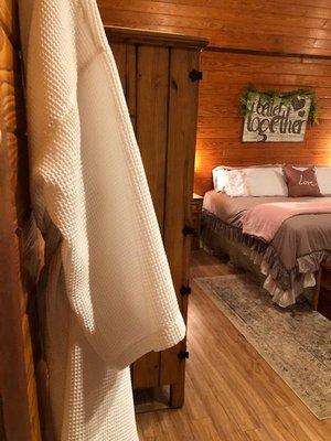 His & her waffle weave robes in the romantic loft bedroom