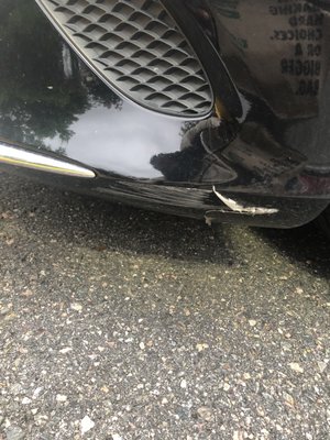 My bumper before it was fixed at Bob's (after I hit the curb)