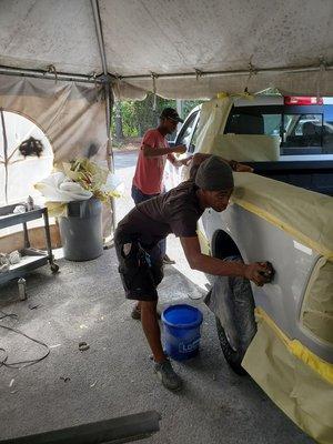 Vehicle being repaired due damage on bed side