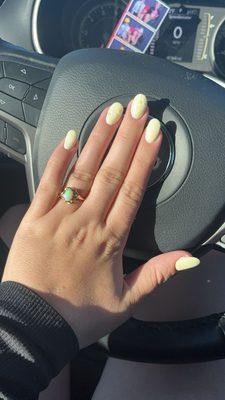 I asked for a light yellow base color and daisies on my ring and middle finger with an oval shape! Done perfectly!