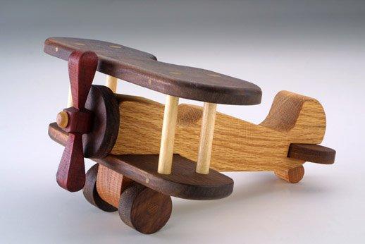 Cherry, maple and walnut wood biplane, handcrafted in Nebraska