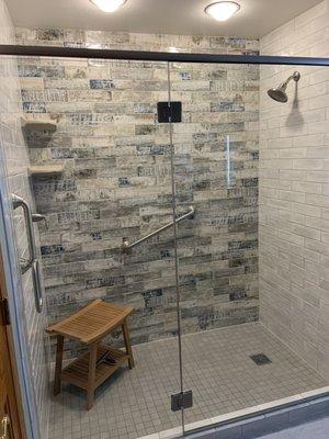 Our new shower. It was not the easiest tile job but it was beautifully done.