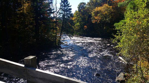 A downstream view of the Peshtigo from the large footbridge at McClintock Park