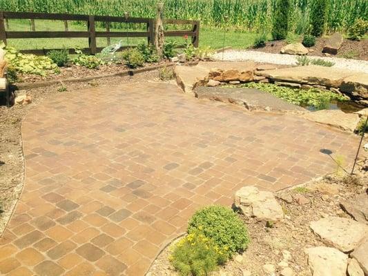 Paver Patio around a fish pond