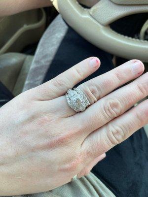 Admiring my new ring and my wedding rings that they re-rhodium plated for me.