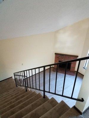 Stairway from LR to loft/master suite in 3-bedroom townhome units