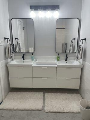 Bathroom remodel after (new tiles, double sink)