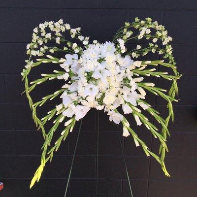 Custom angel wings sympathy flower arrangement