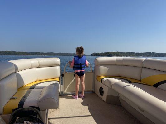 Kiddo wearing the life jacket they let us borrow. Super appreciative of their hospitality!