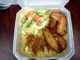 Fish and rice with salad