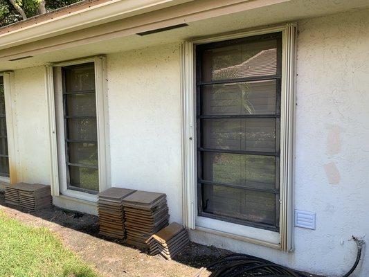 Old awning windows to be replaced with double hung.