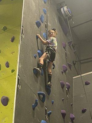 Daughter climbing on her 8th birthday party.