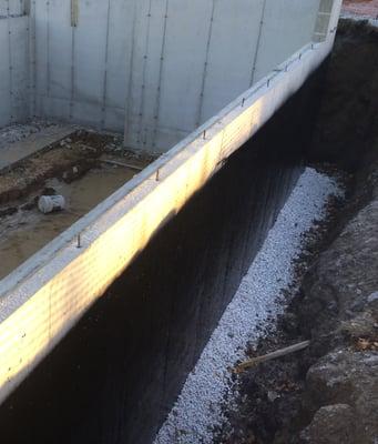 Waterproofing and Drain tile with gravel on a basement