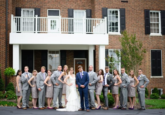 Bridal party posing in front of the Inn.