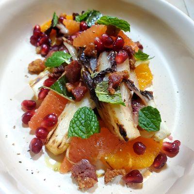 Grilled treviso and endive, citrus, pomegranate, mint... pancetta optional.