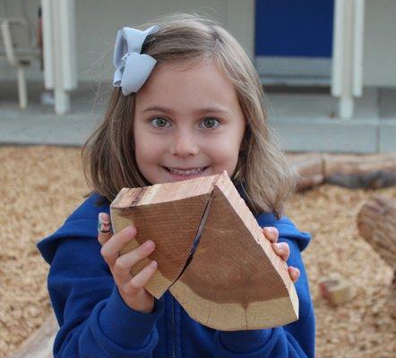 The Nature Explore Outdoor Classroom offers an enriching environment for students to explore concepts in math, literature, art, and science.