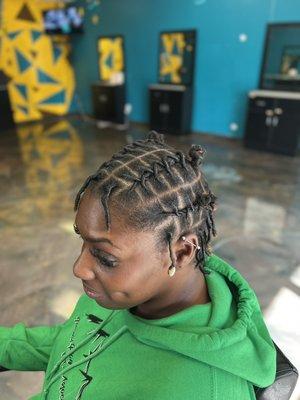 Short Locs with style.. Retwist and style with shells added