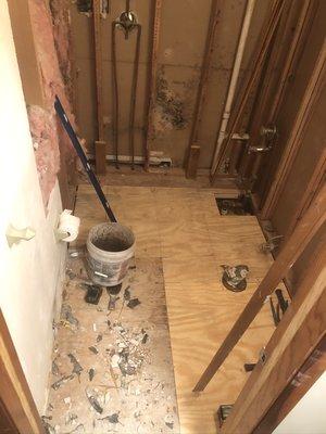 New subfloor being installed in a bathroom