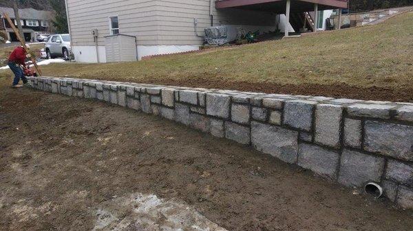 Wall completed by us. Contact us for a free estimate.