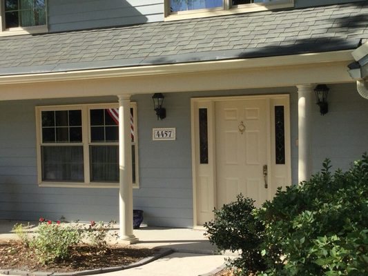 Front of our home after Paragon Painting and Pressure Washing completed the repairs and exterior painting