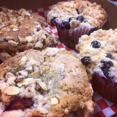 Fresh baked muffins. Blueberry strussel and raspberry almond strussel