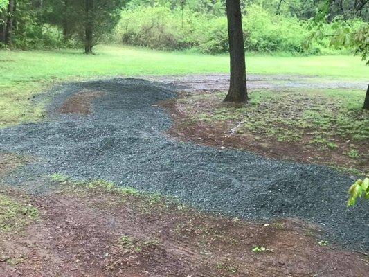 piles of gravel dropped and not spread