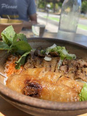 Vermicelli noodles with lemongrass steak and imperial rolls