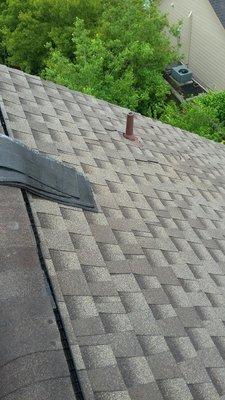 Shingle repair on a residential roof